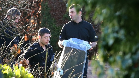 Police carried plastic bags