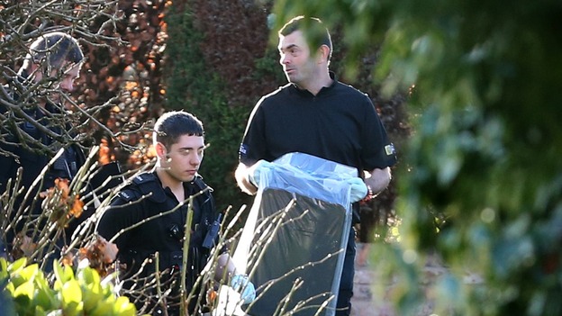 Police carried plastic bags