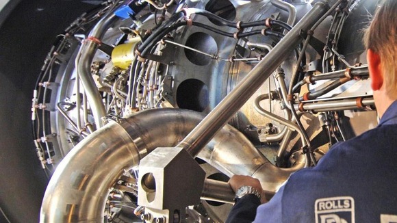 Rolls-Royce worker with the company's MT30 engine