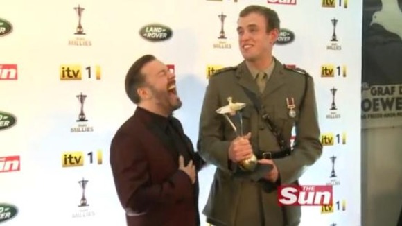 Ricky Gervais with Si Maxwell, winner of the Overcoming Adversity award