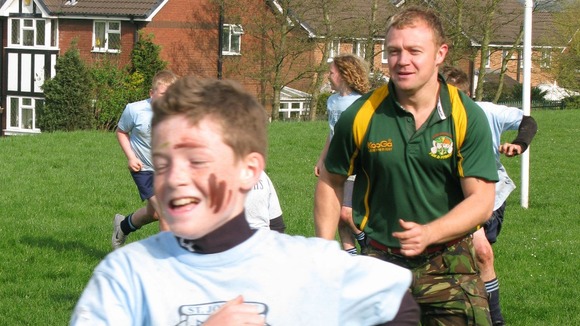 Mike Hamilton, Commando Joes' founder, delivering a fitness session at a school in Manchester.