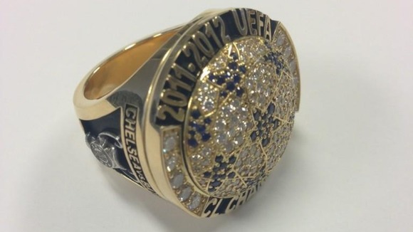 Each gold, diamond and sapphire ring is individually inscribed for each player.