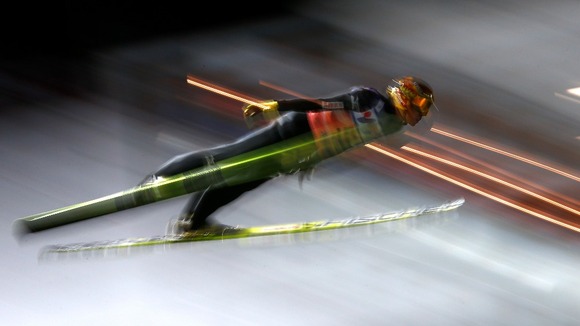 Noriaki Kasai from Japan jumps through the air.
