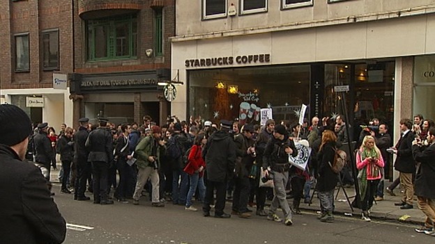 Protesters outside a Starbucks in London