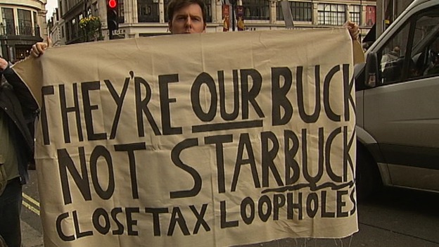 Protesters outside a Starbucks in London