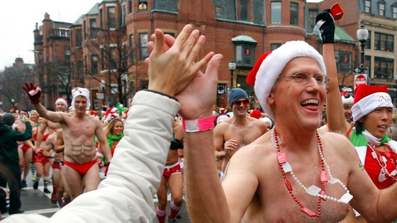 Participants in the annual "Santa Speedo Run" leave the starting line in Boston.
