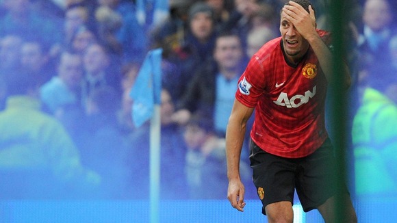 Rio Ferdinand holds his head