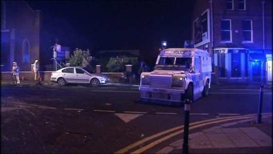 Police were attacked with petrol bombs and fireworks at Broadway, not far from the M1 motorway.