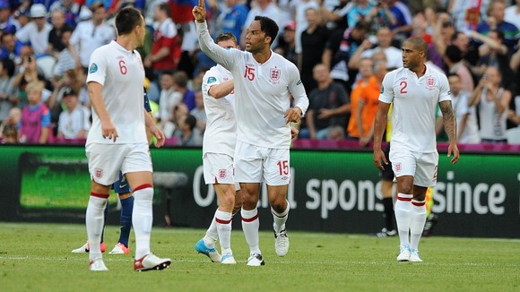 England's Joleon Lescott (centre) celebrates after he scores the opening goal of the game against France in June