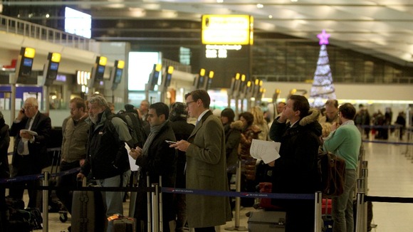 Passengers prepare to depart from Terminal 5 at Heathrow