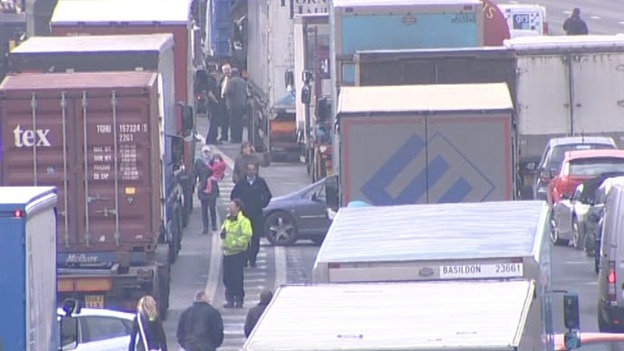 People abandon their cars as traffic stands still