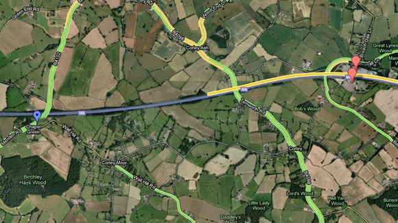The blue arrow is where the lorry is, the red arrow is Corley Services