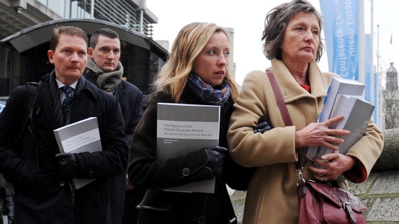 Geraldine Finucane, with her 3 children Michael (far left), Katherine and John (second left)