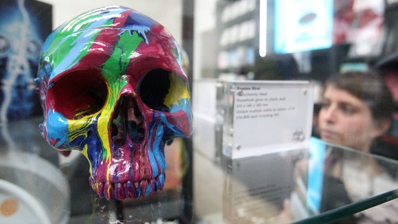 Damien Hirst replica plastic skulls for sale in the gift shop at the Tate Modern.