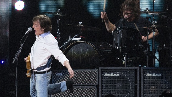 McCartney performs with Dave Grohl during the "12-12-12" benefit concert