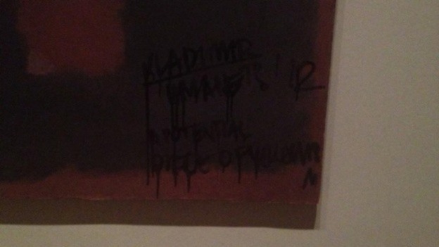 Black writing appeared on the work by Mark Rothko