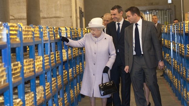 The Queen and Duke of Edinburgh were surrounded by shelves of gold during their trip to the Bank of England today