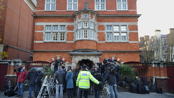 Members of the media gathered outside Westminster Coroner's Court.