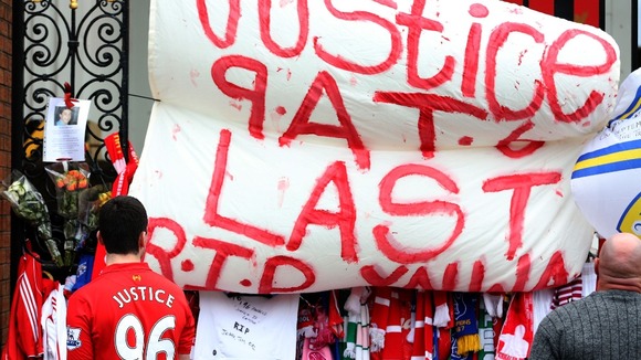 Tributes placed on the Shankly Gates next to the Hillsborough Memorial at Liverpool's Anfield Stadium
