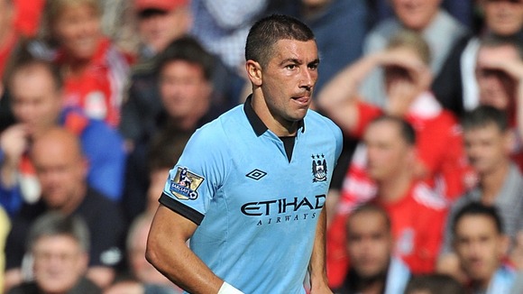 The Manchester City player, Aleksandar Kolarov, who is a Serbian international, is believed to have become involved in an exchange with two spectators holding an Albanian flag.