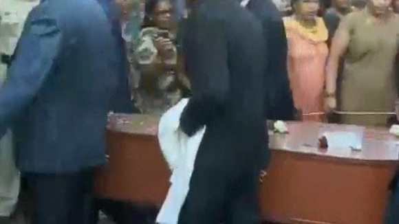 Jacintha Saldanha's coffin is carried into church for her funeral.