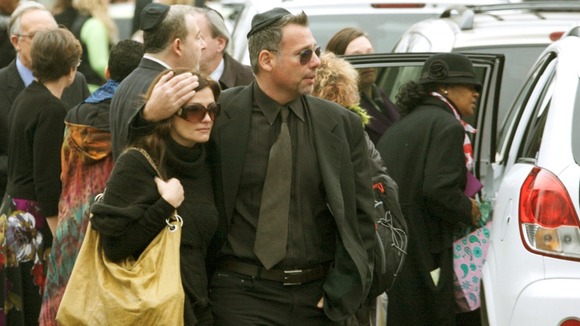 Mourners leave a funeral service for Noah Pozner, the youngest victim of the Sandy Hook Elementary School shooting