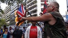 Protesters burn the British flag in Buenos Aires.