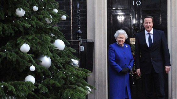 David Cameron greets the Queen on the steps of Number 10