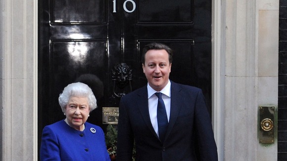 David Cameron greets the Queen on the steps of Number 10