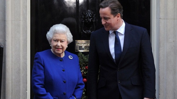 David Cameron greets the Queen on the steps of Number 10