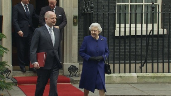 The Queen leaves with Foreign Secretary William Hague