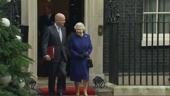 The Queen leaves with Foreign Secretary William Hague