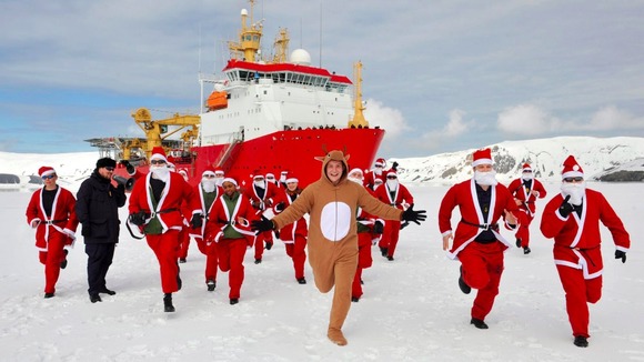 Crew members of HMS Protector start their ice run
