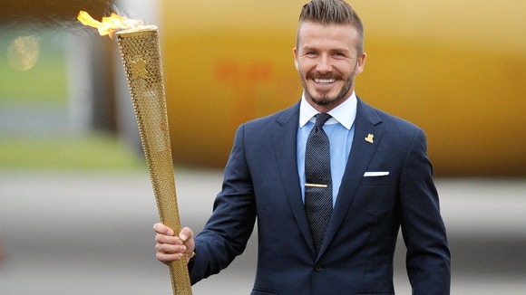 David Beckham with the Olympic torch