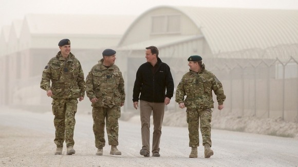 David Cameron seen walking through Kandahar Airfield in 2011