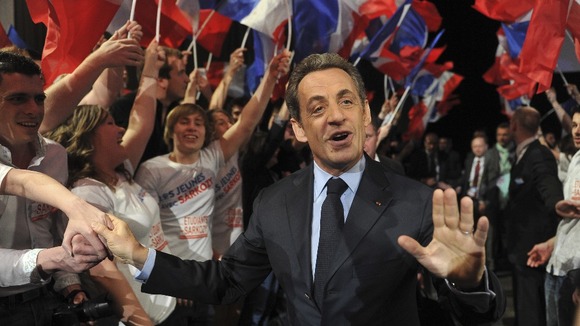 Nicolas Sarkózy greets the crowd at a political rally in Nancy
