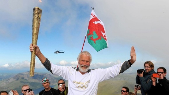 Sir Chris Bonington with the Olympic torch