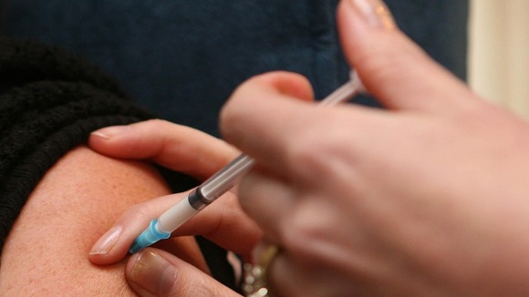 Patient being given a flu jab