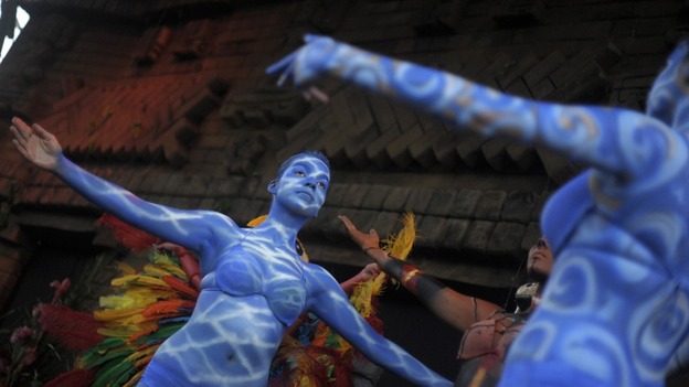 Performers in costumes take part in a Mayan Culture Festival in downtown Copan in Western Honduras