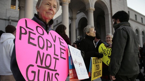 People gather for interfaith candlelight prayer vigil to end gun violence in Los Angeles