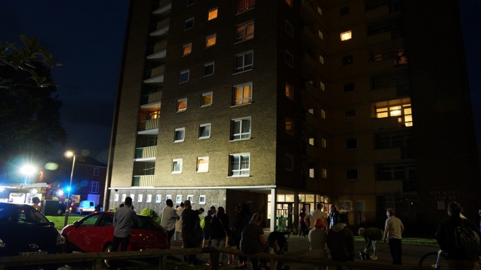 A woman was treated for the effects of breathing in smoke in the fire in the block of flats in Bedford.