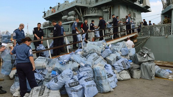 Mail bags being loaded on board