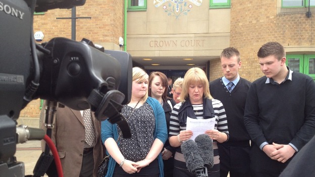 Kevin Harrison's widow speaks outside court