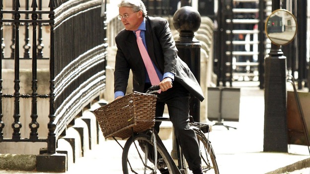 Andrew Mitchell pictured on his bike at Downing Street last year