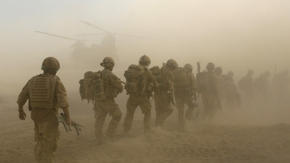 British soldiers boarding a Chinook helicopter in Helmand