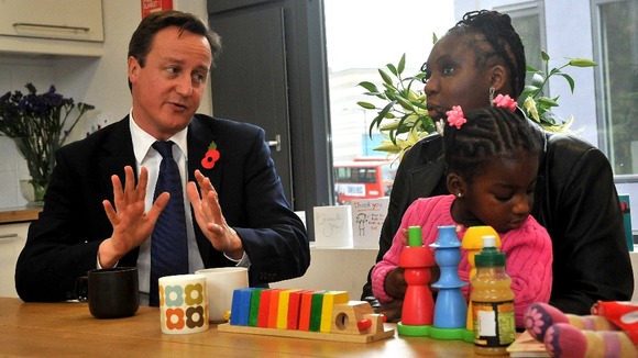 David Cameron with Karen McKellar and her adoptive daughter during a meeting in October