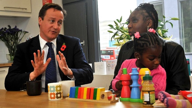 David Cameron with Karen McKellar and her adoptive daughter during a meeting in October