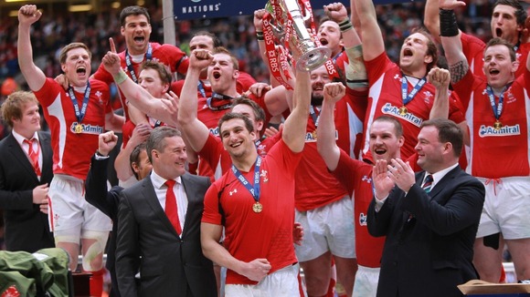 Welsh rugby team celebrating Grand Slam