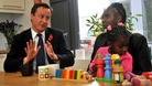 David Cameron with Karen McKellar and her adoptive daughter during a meeting in October