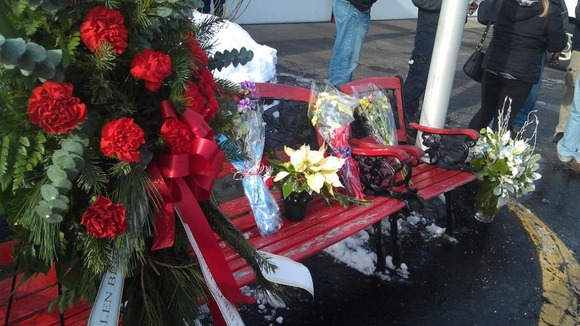 Flowers laid outside West Webster Fire Station